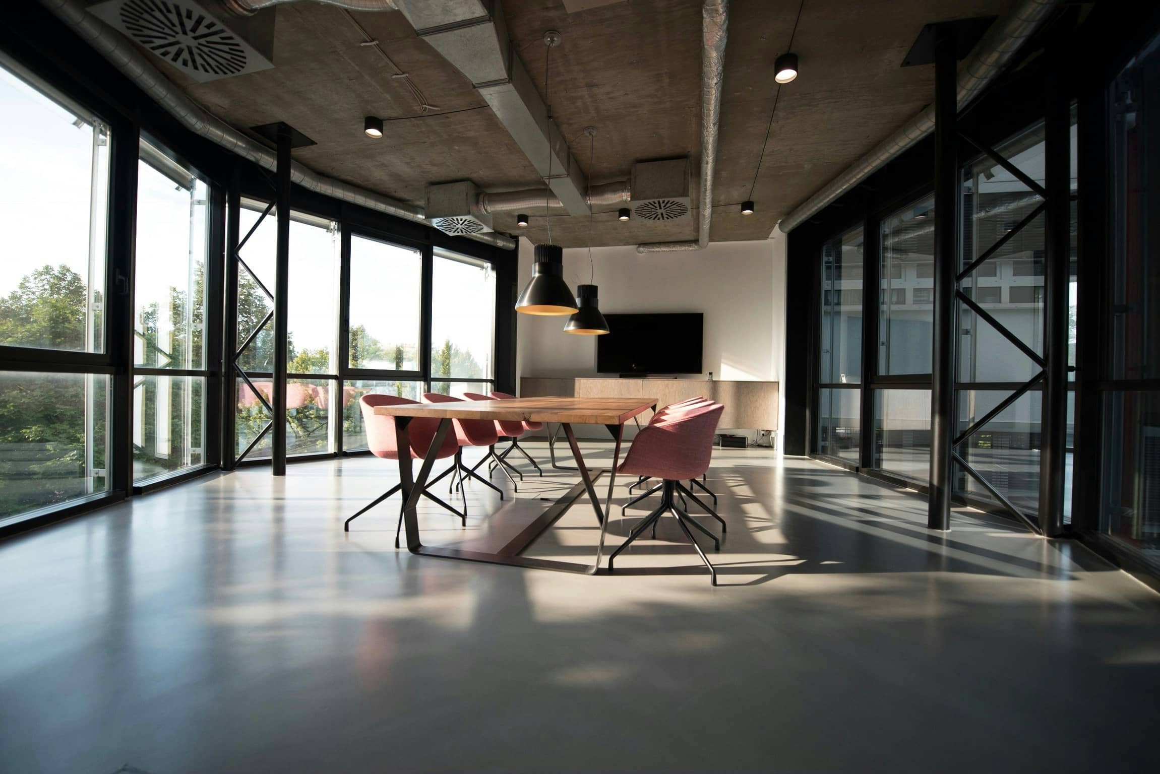 An open-plan office with meeting tables