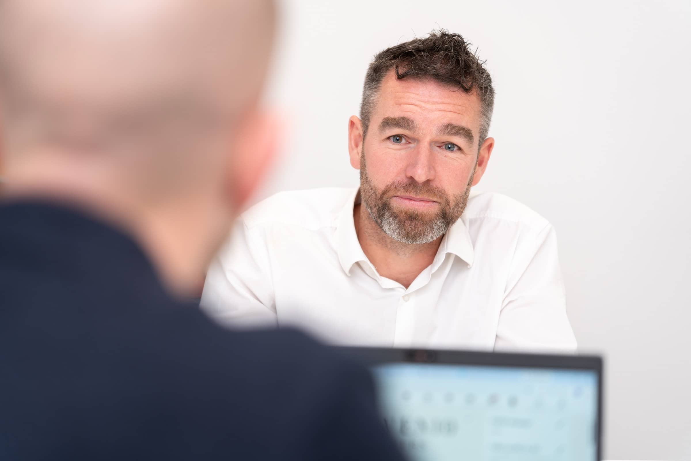 A client in conversation with Matt Iles